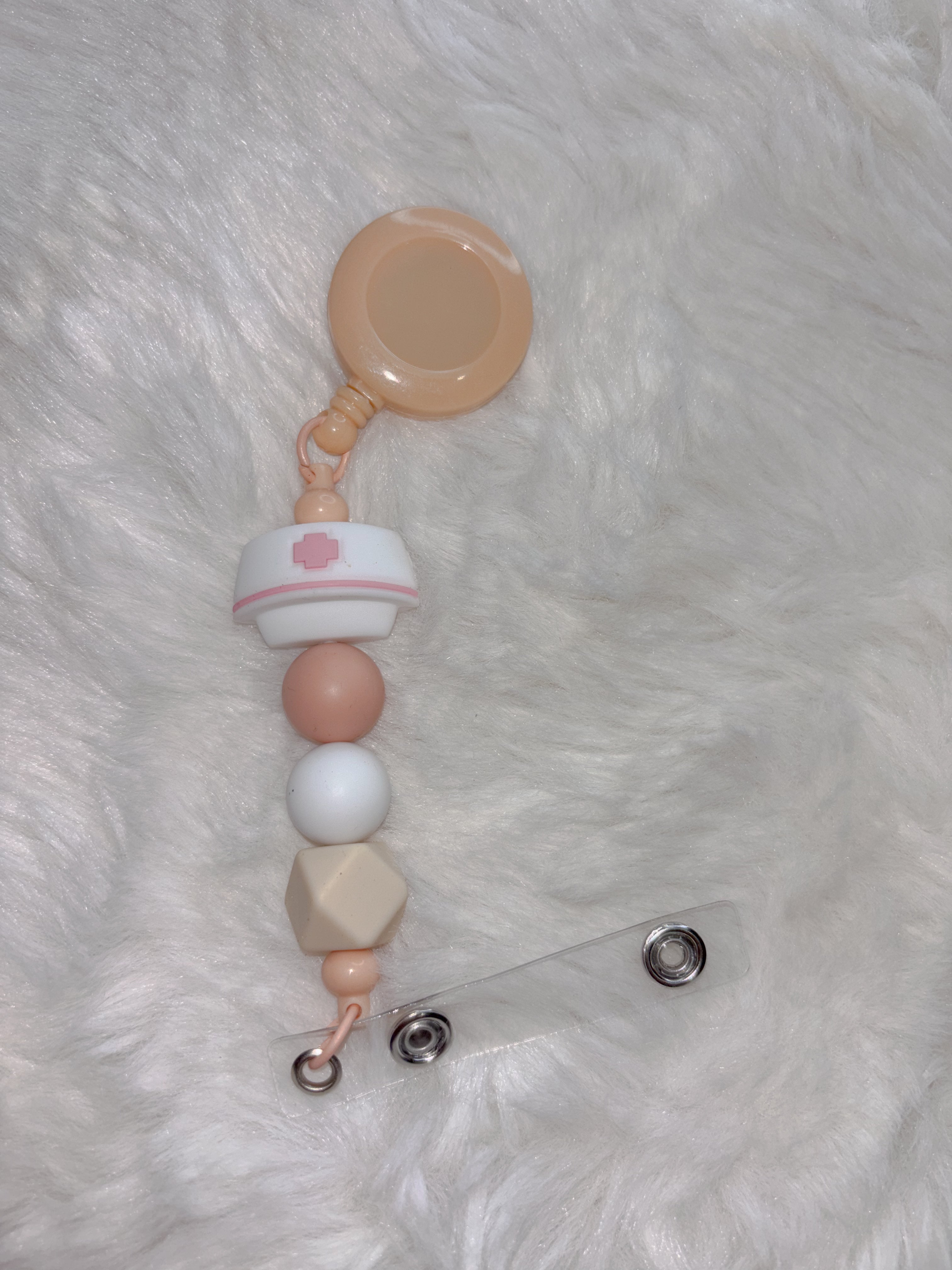 Retractable beaded badge clip - nurse hat