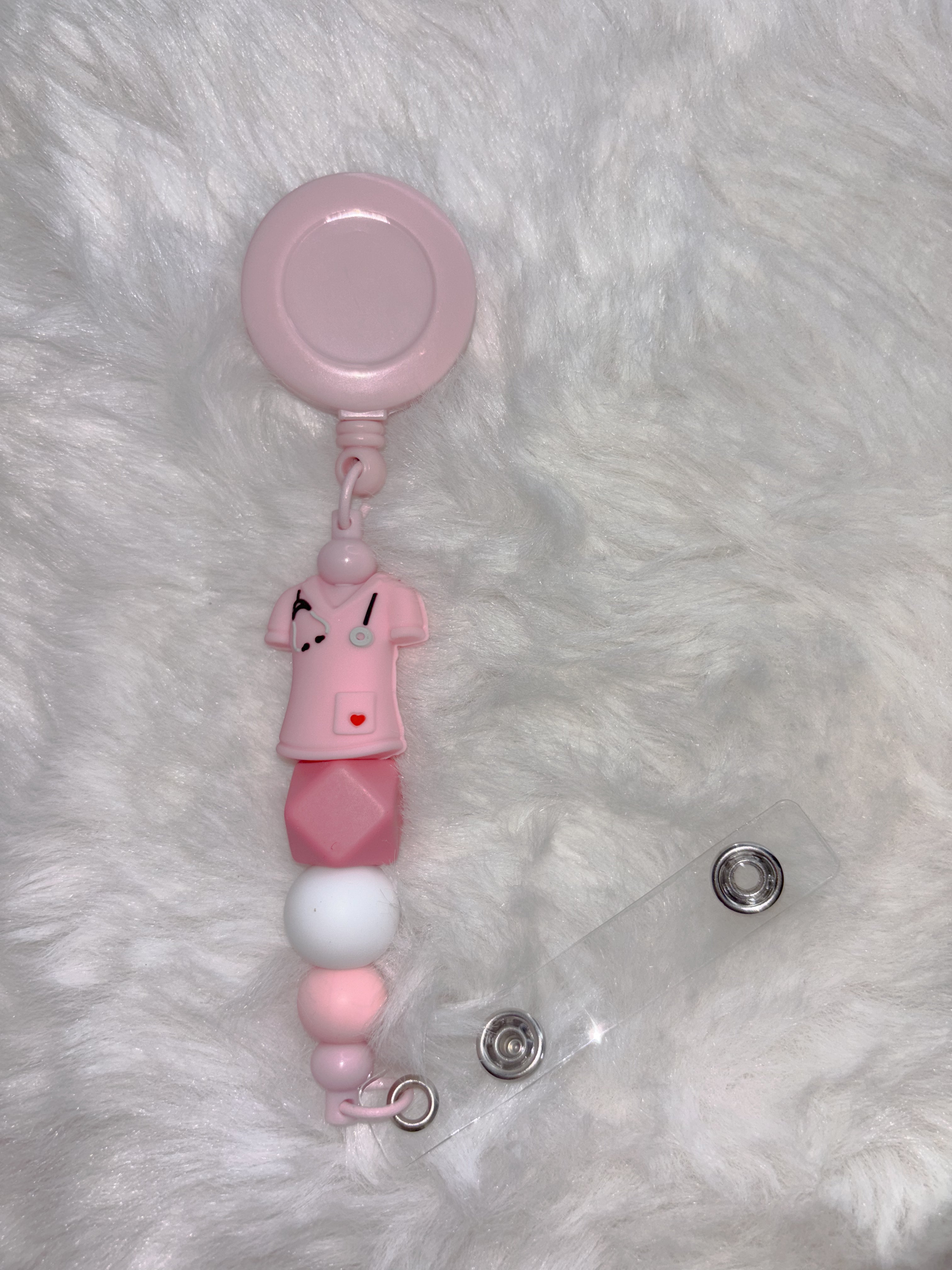 Retractable beaded badge clip - pink scrubs
