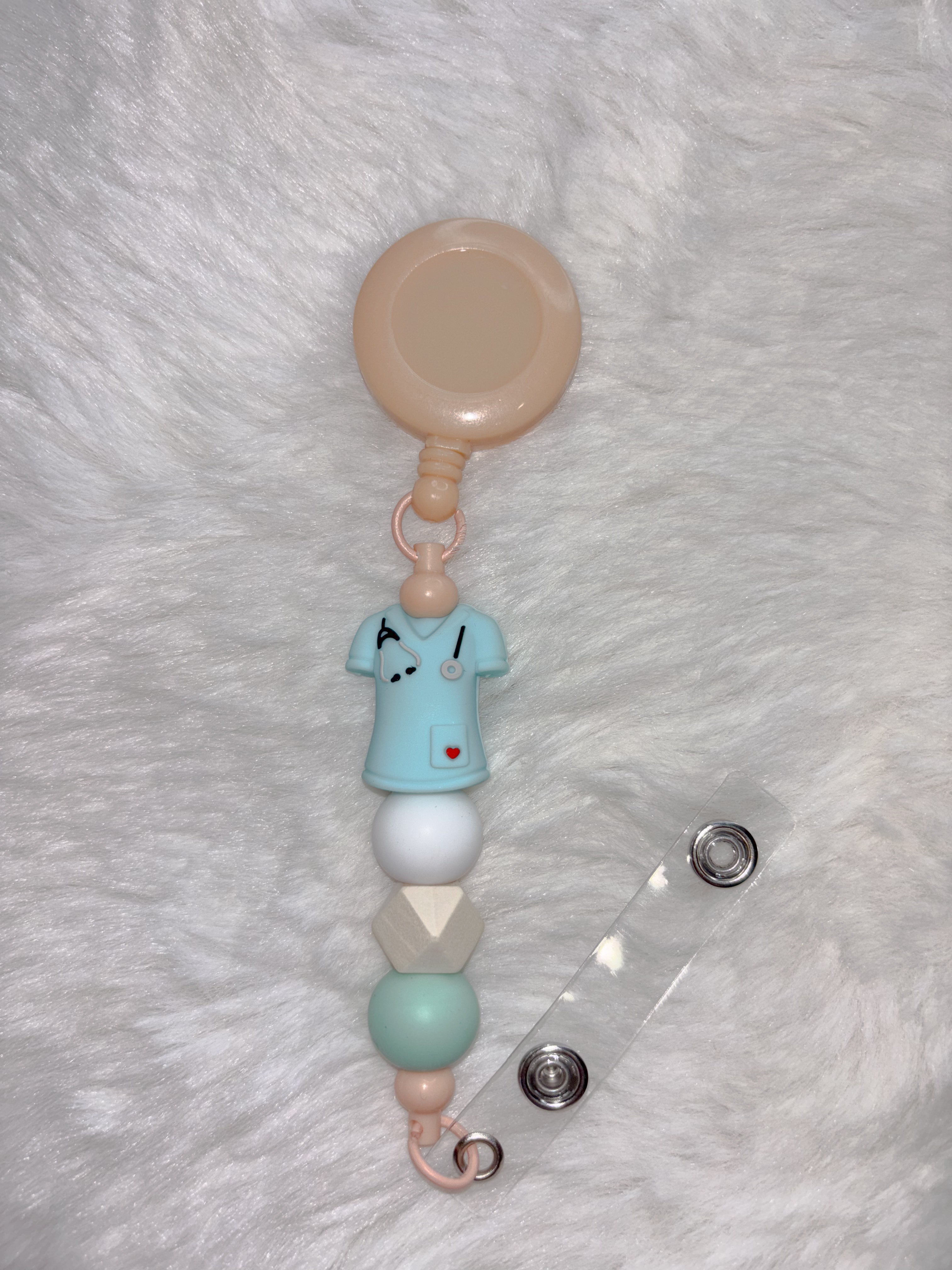 Retractable beaded badge clip - blue scrubs